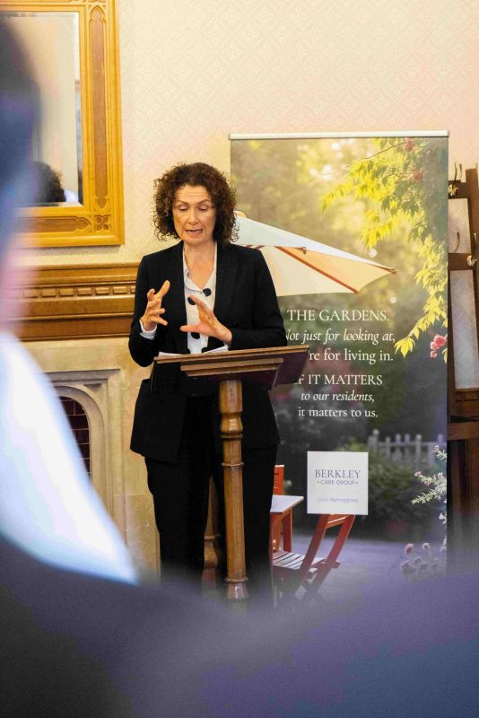 A speaker at the lectern at the reception launching Berkley's Dementia Strategy